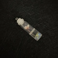 Resin glass cylinder pendant with light pink dried flower and white rubber stopper - White