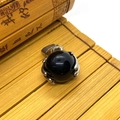 Polished black obsidian sphere pendant with silver four-prong setting and large bail - Black Agate