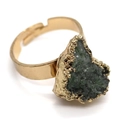 Top view of a gold open ring with an irregular dark green crystal stone and hammered metal - Dark Green Raw Stone (No. 4)