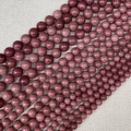 Polished dusty rose natural stone round beads in multiple sizes for DIY jewelry making - Rhodochrosite