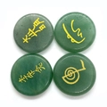 Polished green aventurine reiki stones with golden engraved healing energy symbols - Green Aventurine