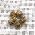 Five geometric faceted picture jasper pendants with golden metal loops on white fabric - 8X12mm / Picture Jasper (Yellow Edge)