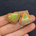 Natural heart-shaped emperor stone connector pendant with golden metal edging and loops - 21x33mm / US 11