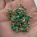Golden copper chain with multifaceted green and iridescent natural stone beads for DIY jewelry - 10m/Roll