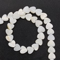 Cuentas de concha natural en forma de corazón blanco para creación de joyas DIY - 6mm / Agujero Recto