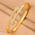 Exquisite gold-plated titanium steel bracelet featuring double diamond-set circular motifs - Gold