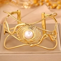 Bracelet jonc ouvert de style ethnique en forme de serpent avec perle blanche dorée - Style Perle Ouverte
