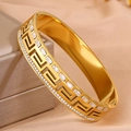 Detailed macro view of 18K gold plated bangle featuring Greek key pattern and crystals - Gold Double Row Diamond Meander Pattern Bangle / Gold