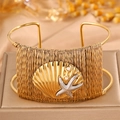 Gold braided stainless steel open bangle with scallop shell and starfish detail - Steel Wire Woven Style / Gold Starfish Shell