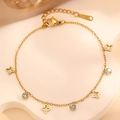 Detail of gold stainless steel bracelet with star charms and crystal stones on a display - Gold Color Four-pointed Star