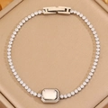 Bracelet tennis chic en acier titane orné de cristaux cubiques et fermoir pliable sécurisé - Style Carré Argent