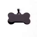 Close-up of a polished bone-shaped black stainless steel pet tag with a mirror finish - 36*22MM / Black
