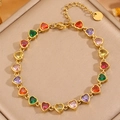 Rainbow heart zircon tennis bracelet in gold stainless steel for women on a jewelry display - Heart Colorful Zircon