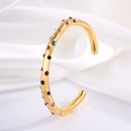 Bracelet croisé en acier titane doré orné de pierres multicolores éclatantes - Style Strass Multicolore / Coloré