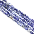 Gefacetteerde ovale blauwe sodaliet natuursteen kralen voor DIY sieraden maken en hobby - Ongeveer 25 Stuks / Blauwe spotsteen