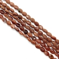 Gefacetteerde ovale goudsteen kralen met gouden glitters voor DIY sieraden maken - Ongeveer 25 Stuks / Goudzandsteen