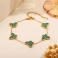 Golden stainless steel bracelet with five butterfly charms featuring green striped inlay - Five Butterfly Green Charm Bracelet