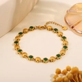 Adjustable golden stainless steel link bracelet with inlaid green zircons and lobster clasp - Round Green Zirconia Polished Bracelet