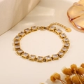 Elegant gold heart flower bracelet featuring square-cut clear cubic zirconia stones - Square White Stone Inlaid Bracelet