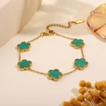 Golden titanium steel bracelet with green malachite clover charms and bead edges - Green Textured Floral Bracelet