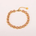 Golden link bracelet featuring 17 square pink gemstones with adjustable lobster clasp - Square Pink Zirconia Row Bracelet
