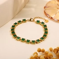Golden titanium steel bracelet featuring square green gemstones and a lobster clasp - Square Green Gemstone Bracelet