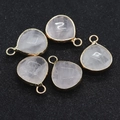 Five teardrop rose quartz pendants with gold edges and white letter engravings - Rose Quartz