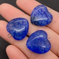 Three blue dragon vein agate heart pendants with silver bails held in hand for size detail - Blue Style (2)