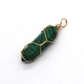 Hexagonal malachite stone pendant with gold wire wrap and natural green marble textures - Malachite