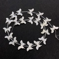 Natural shell butterfly-shaped beads for DIY jewelry making on black background - Butterfly / 13x20mm