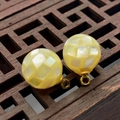 Macro view of 8-12mm yellow iridescent seawater shell mosaic sphere pendant charms - 8mm / Yellow Shell