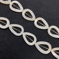 Macro view of teardrop natural shell beads with pearlescent luster for DIY jewelry making - Waterdrop Style (5)
