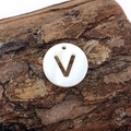 Natural white shell round bead featuring a cutout letter V for DIY jewelry necklaces - Letter V
