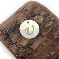 Natural freshwater shell round pendant with golden letter V and iridescent luster - Letter U
