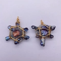 Detailed macro view of handmade wire-wrapped baroque pearl pendants with gold wire - US 4