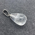 Teardrop-shaped clear crystal natural stone pendant with a polished silver metal clasp - 1.3cm x 2.3cm / Transparent Crystal
