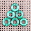 Pendenti a ciambella con motivo malachite e texture circolari in pietra verde per DIY - Malachite