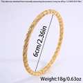 Detailed view of gold stainless steel bangle showing engraved leaf texture and 6cm diameter - Gold Scratched Cylinder Bamboo Style