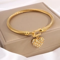 Gold twist cable open bangle featuring a sparkling pave heart charm on cream leather - Heart Zircon Horseshoe