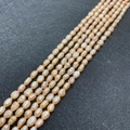 Natural peach pink freshwater pearls in irregular rice shape for jewelry DIY crafting - 4-5mm (10g) / Pink