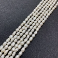 Baroque style natural white freshwater pearls for DIY jewelry making on black background - 4-5mm (10g) / White