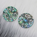 Abalone shell round pendant featuring a butterfly cutout design on white faux fur background - 023 Round 30mm