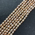 Champagne pink baroque freshwater pearl strands for DIY jewelry making 5-8mm beads - Orange / Small