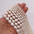 Natural freshwater baroque pearl strands in creamy white with varying sizes from 2 to 7mm - White / Small
