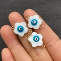 Detail showing freshwater shell flower connectors with evil eye bead for DIY jewelry - Blue