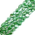 Macro shot of irregular light green baroque beads with metallic luster for DIY jewelry - Style 6 (Light Green)