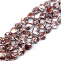 Detailed view of rose gold baroque shell beads for DIY jewelry with metallic texture - No.8 (Rose Bronze)