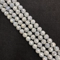Detailed macro view of faceted white natural shell beads showing iridescent luster and finish - Standard Type / 8mm (50 Pieces/Strand) / Silver