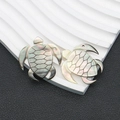 Natural black shell turtle pendant with iridescent luster and detailed shell carvings - Turtle Shape