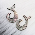 Carved black shell teardrop charms with tribal wave patterns and iridescent finish - Fishhook Shape